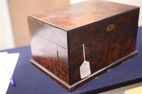 A Victorian amboyna games compendium, width 13in. height 7.5in.